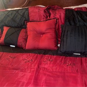 Brand new red/black comforter set with pillows to match. Unused.No longer needed